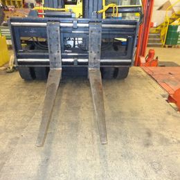 Dispositif de réglage des fourches Stabau